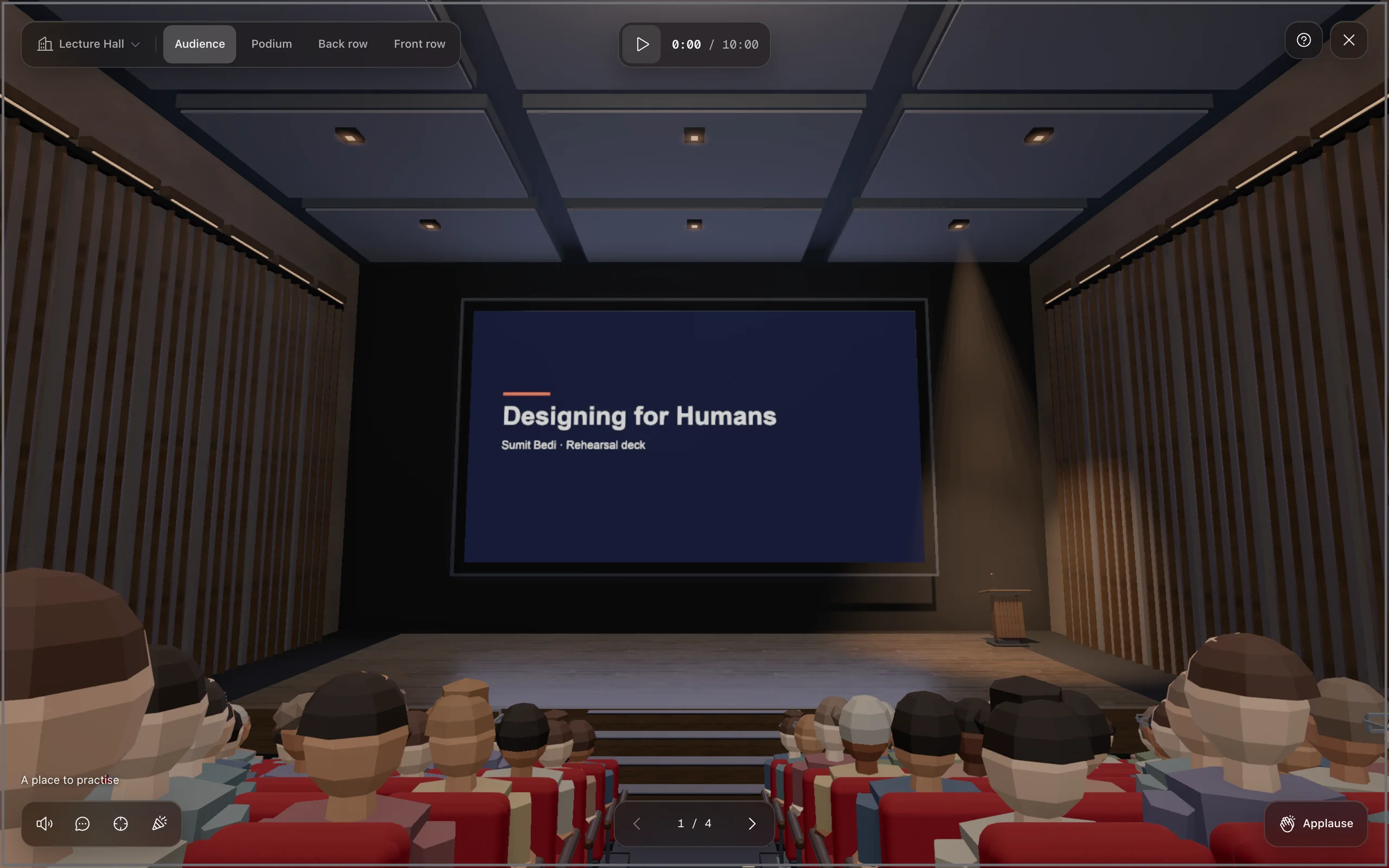 A Google Slides talk titled Designing for Humans on the big screen of a lecture hall, rows of audience in front, rehearsal controls floating at the edges